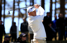 Home favourite Wallace survives stumble to hold share of British Masters lead