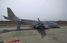 Pilot lands Myanmar plane safely without front wheels