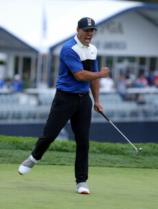 Koepka survives major Sunday scare to defend PGA Championship title