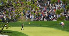 One hop and in! World number 44 nails six-iron for memorable Bethpage ace