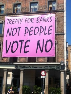 Mick Wallace erects giant pink Vote No banner on Dublin restaurant