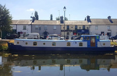 Sleep Here: A one-of-a-kind houseboat (that's moored outside a pub)