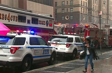 One dead as helicopter crash lands onto New York skyscraper
