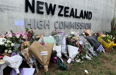 Man accused of killing 51 people in Christchurch mosque massacre smiles and pleads not guilty