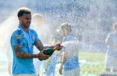 Walker pens two-year extension with treble champions City