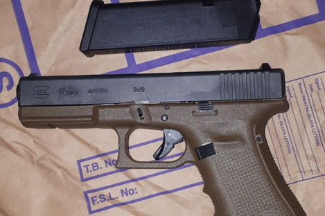 One of the handguns found during the searches.