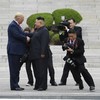 'It's a great day for the world': Trump invites Kim to US after symbolic 'handshake of peace'