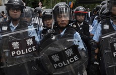 Hong Kong protest: Riot police fire tear gas on crowd hours after group breaches parliament