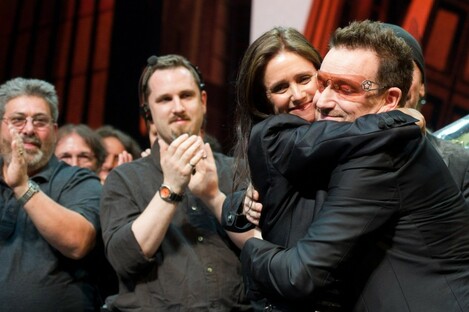 Julie Taymor and Bono appear onstage at the curtain call for the opening night performance of the Broadway musical "Spider-Man Turn Off the Dark" in New York, Tuesday, June 14, 2011