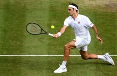 Semi-final bound Federer makes history with 100th Wimbledon win