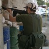 Syrian clashes spill into Lebanon as seven die in gun battle