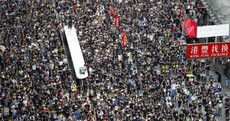 Tens of thousands march in another huge anti-government rally in Hong Kong