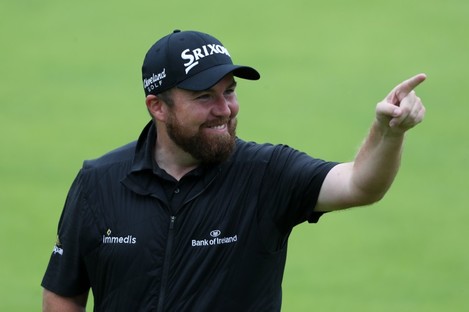 Shane Lowry on the 18th green in Portrush yesterday. 