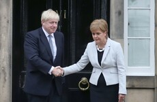 Boris Johnson gets booed as he arrives at Bute House to speak with Nicola Sturgeon