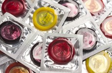 Harris says condoms will be distributed across third level colleges in the final months of the year