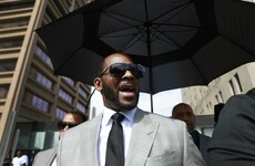 R Kelly charged with prostitution and solicitation involving 17-year-old girl