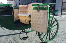 Children and teens taking the reins of horse-drawn tourist carriages in Dublin city centre