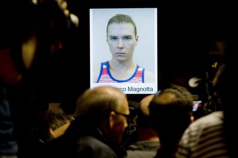 The photograph of Luka Rocco Magnotta,is shown during a news conference in Montreal yesterday