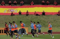 Champions Spain undergo light first training run