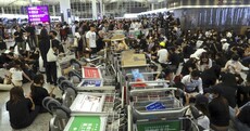 How escalating tensions in Hong Kong have brought one of the world's busiest airports to a standstill