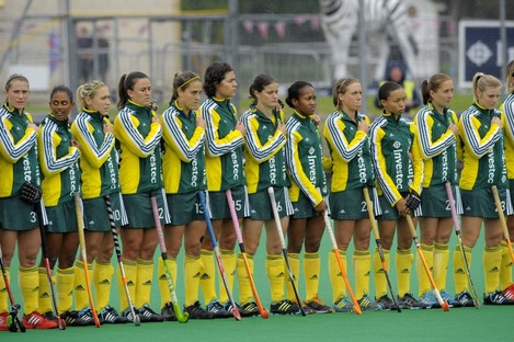 South Africa players stand as the wrong anthem is played yesterday.
