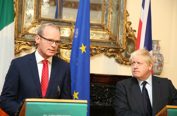 Simon Coveney conveys