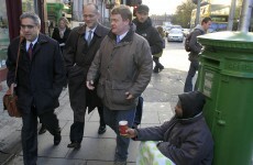 IMF head passes three homeless on way to bailout talks