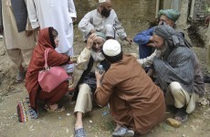 Bomb targeting government bus in Pakistan kills 18