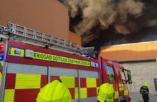 Firefighters battle large blaze at Cork shopping centre