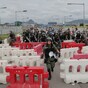 Hong Kong activists block routes to airport after violent clashes in metro station