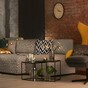 'Use soft lighting to add cosiness': 5 design tips to make a dark living room work in your favour