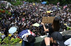 Hong Kong protesters march to US consulate to increase pressure on Beijing