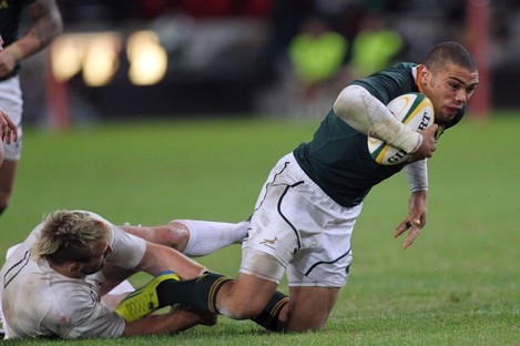 South Africa's Bryan Habana is tackled by England's Joe Marler