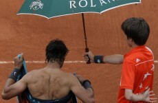 Rain halts French Open final again