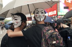 Fresh protests begin as Hong Kong court rejects a challenge to the 'face mask ban'