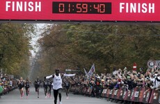 History maker! Kenya's Kipchoge busts two-hour marathon barrier