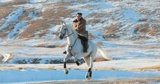 North Korean media releases images of Kim on white horse up sacred mountain