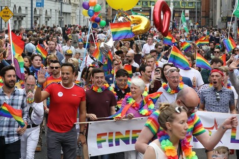 Government ministers, including the justice minister, attend the pride parade in Dublin. 