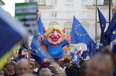 Tens of thousands of anti-Brexit protesters march in London as MPs delay decision