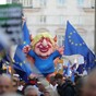 Tens of thousands of anti-Brexit protesters march in London as MPs delay decision