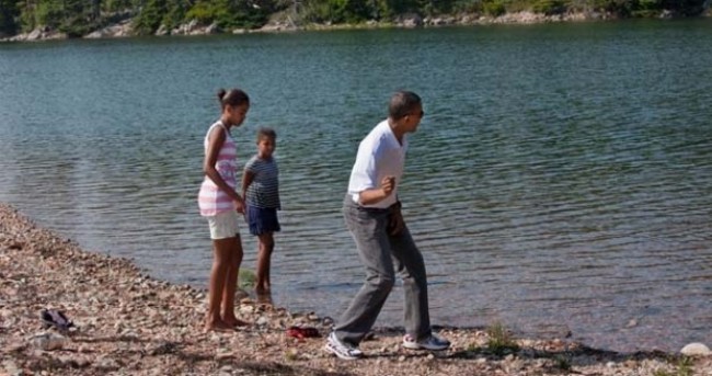 Michelle Obama joins Pinterest; shows Barack skimming stones