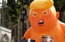 Inflatable baby Trump balloon stabbed and deflated during Alabama football game
