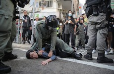 Man set on fire and protester shot by Hong Kong police as demonstrations continue