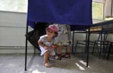 Early exit polls in Greece show top two parties in tie