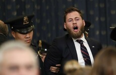 Protester cries 'treason' as Democrats outline impeachment case against Donald Trump