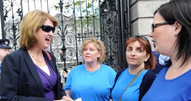 In pictures: Burton confronted outside Dáil over domiciliary care allowance