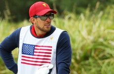 Patrick Reed's caddie banned after clash with fan at President's Cup