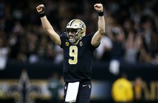 Brees makes history as Saints crush Colts