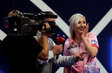 Fallon Sherrock becomes first woman to win match at PDC World Darts Championship