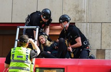 Extinction Rebellion protesters who glued themselves to London train spared jail